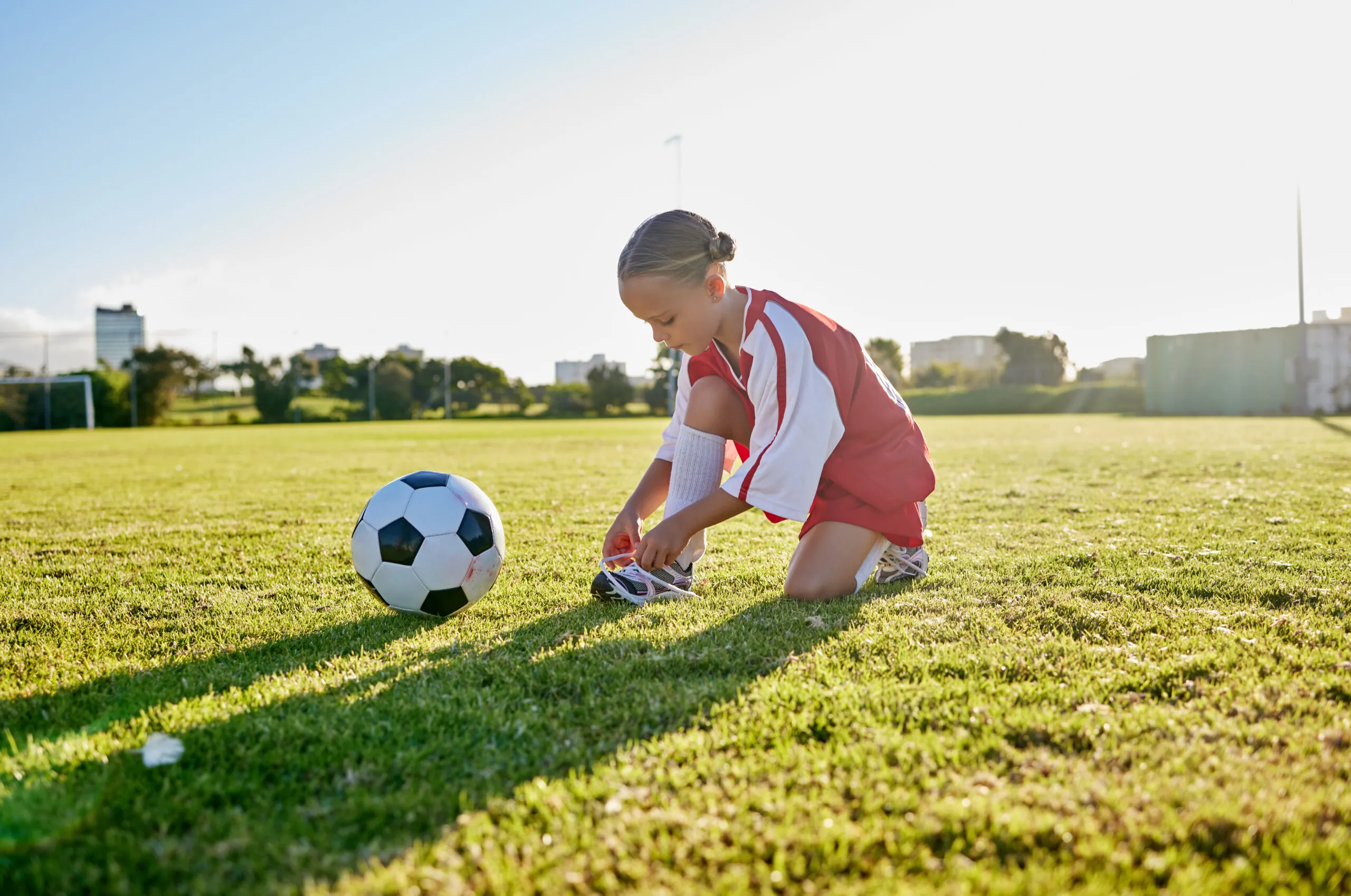 Meisje op het voetbalveld